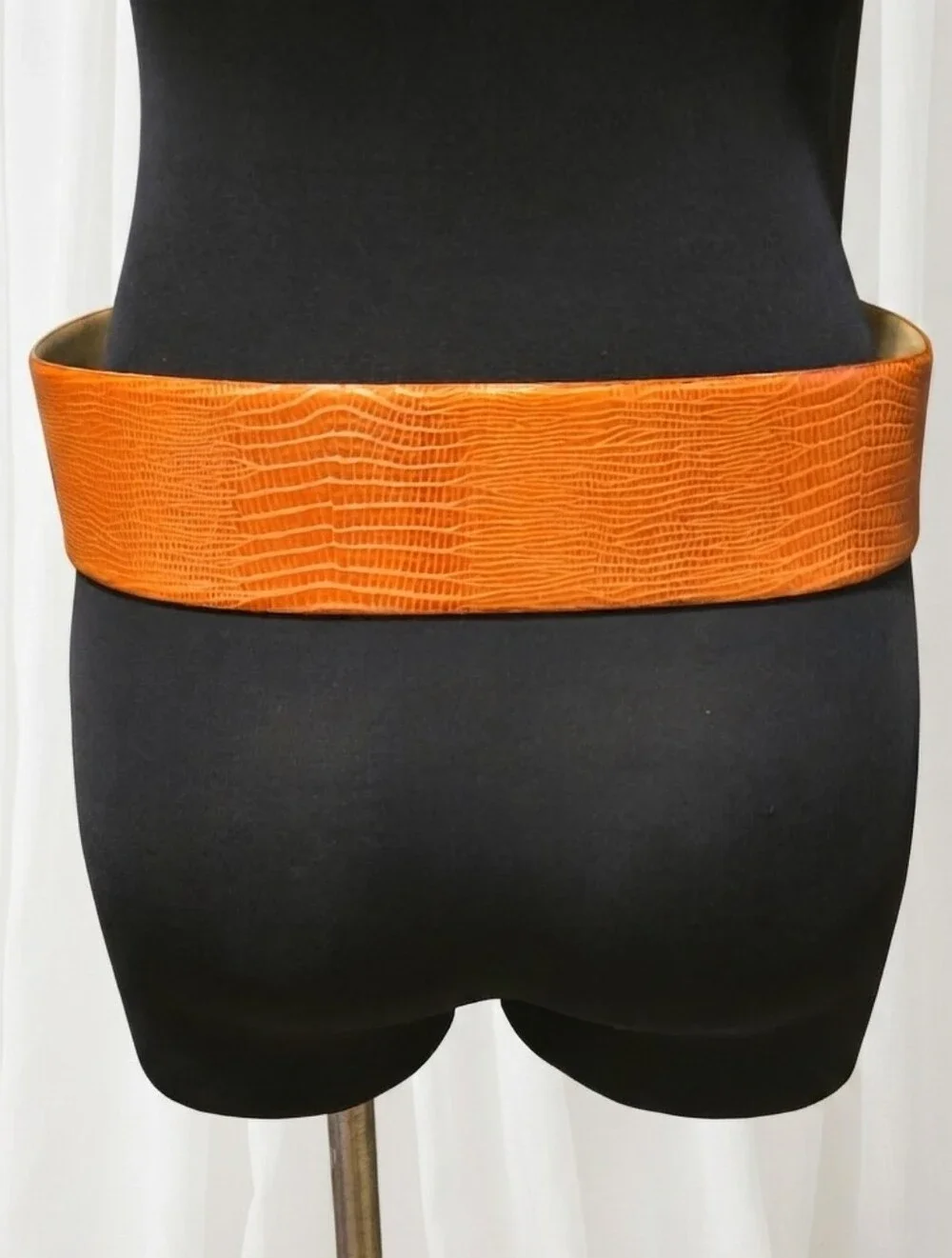 The Ritz Accessories Collection Leather Textured Wide Orange Waist Belt.